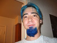 Hair and beard dyed blue.